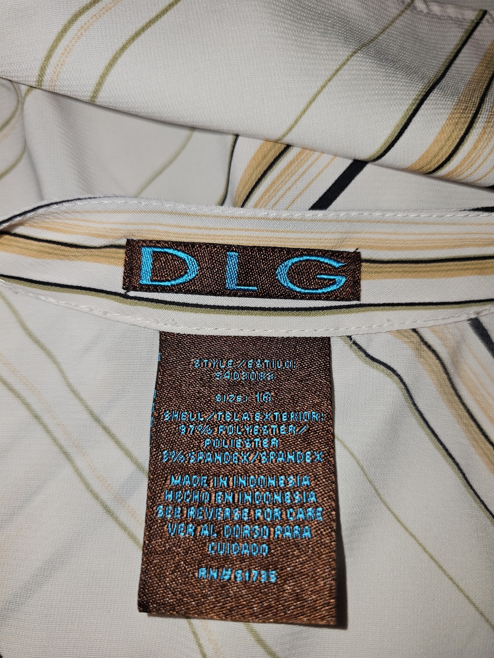 DLG cream and black diagonal striped polyester & spandex blouse with button-up
